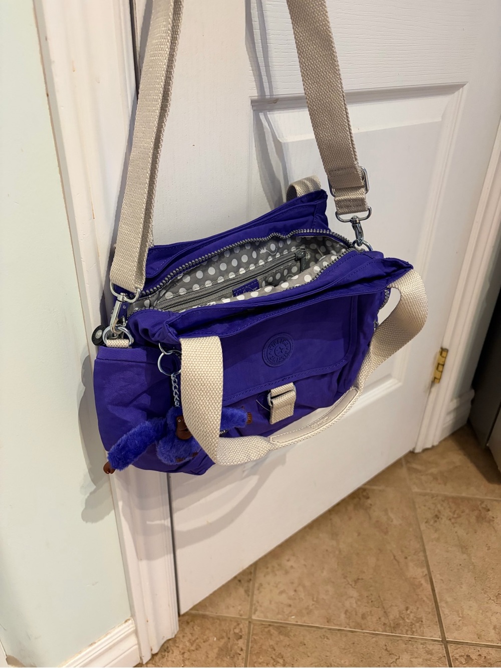 Kipling Vibrant Purple Felix Crossbody Bag with Cream Straps and Polkadot Lining